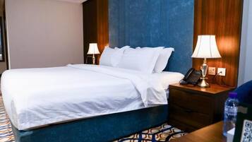Egyptian cotton sheets, premium bedding, down comforters, minibar