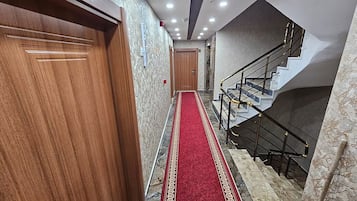 Family Quadruple Room, City View | Interior