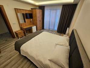 Family Quadruple Room, City View | Free WiFi