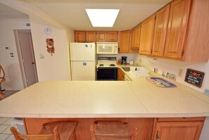 Fridge, microwave, oven, stovetop - Spacious, quaint 2-bedroom condo with free WiFi and a convenient midtown location just a block from the beach! (Ocean City)