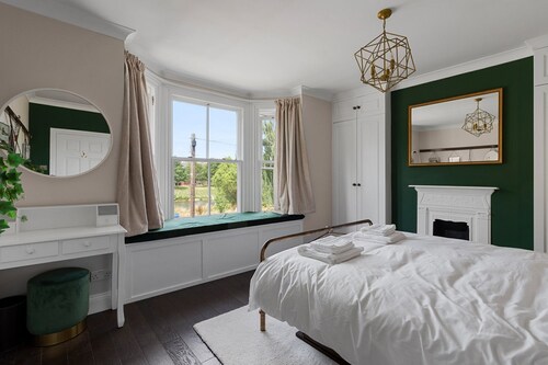 Quayside Haven is a charming three-bedroom period town house