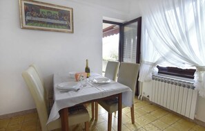 Apartment, 1 Schlafzimmer, Balkon, Gartenblick | Esszimmer
