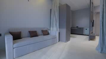 Chambre Luxe | Coin séjour