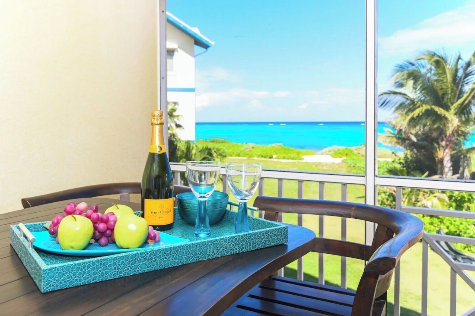 The screened-in patio, enjoy a meal and some good conversation with a great view