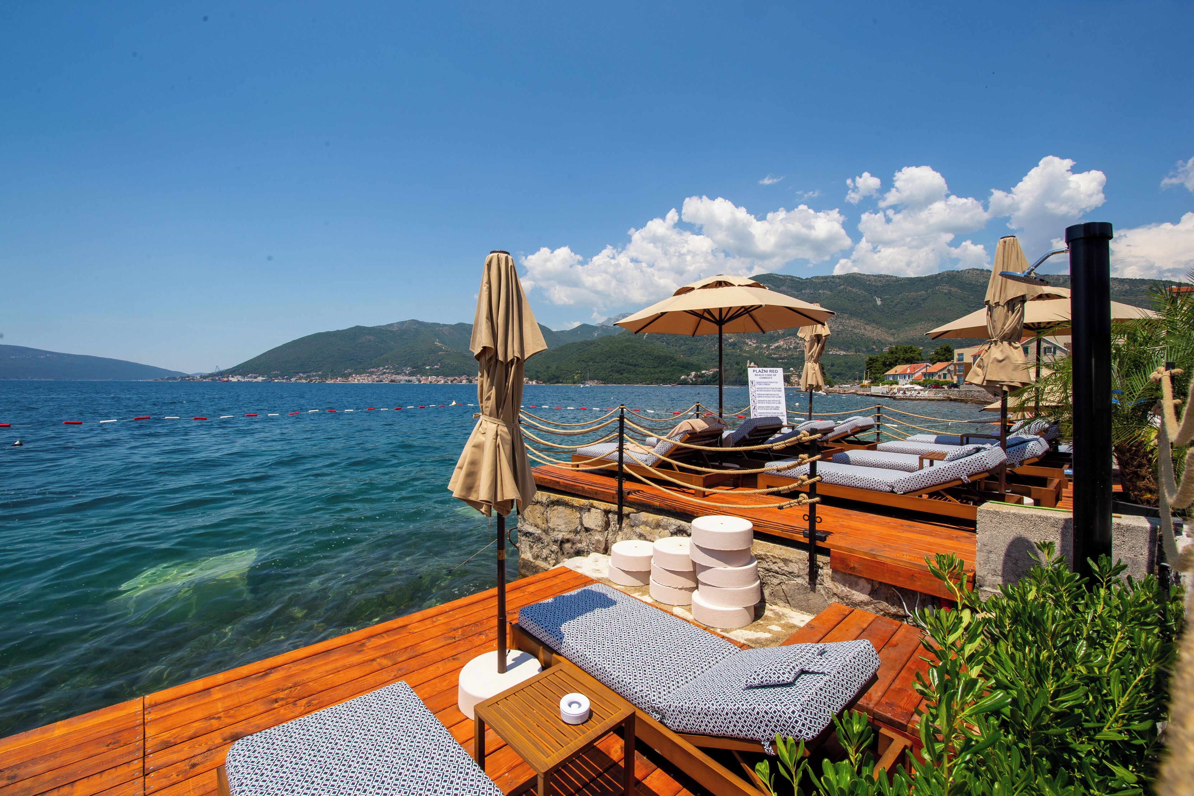 Playa privada, camas de playa gratis, sillas reclinables de playa