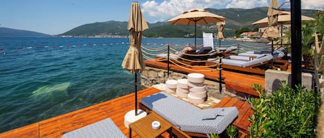 Private beach, free beach cabanas, sun loungers, beach umbrellas