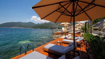 Private beach, free beach cabanas, sun-loungers, beach umbrellas