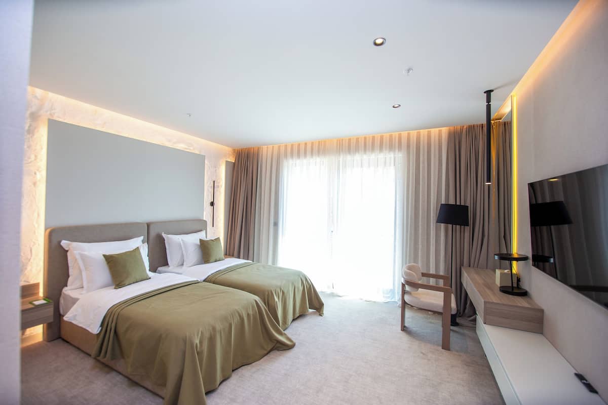 In-room safe, laptop workspace, blackout curtains, soundproofing