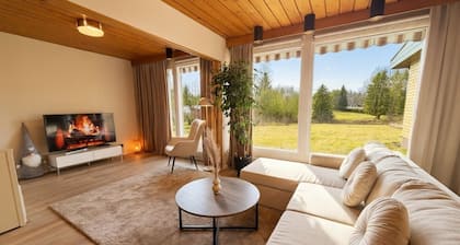 Relaxing Riverside House with Sauna & Fireplace