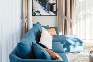 Deluxe villa, uitzicht op zwembad | Woonruimte