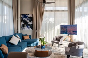 Villa Deluxe, vue piscine | Coin séjour