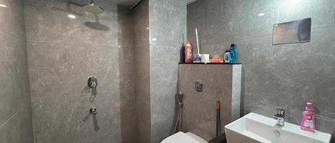Shower, towels, soap, toilet paper