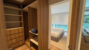 A modern bedroom with a balcony, a wooden wardrobe, and a bed. - w Welcoming 2BR w Private Terrace in Hipodromo (Mexico City)