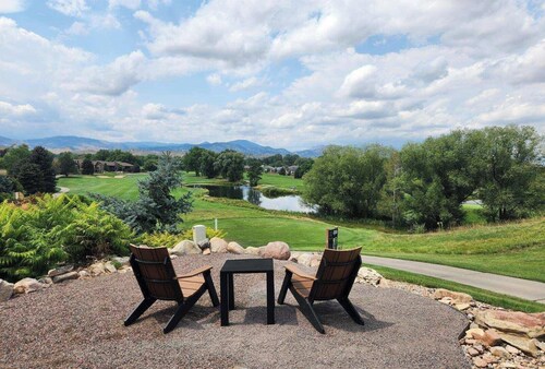 Nestled on the Marianna Butte Golf Course in Loveland, this modern garden-level basement retreat offers stunning mountain & lake views through large windows, flooding the space with light.  Just a short drive to CSU campus & Estes Park