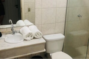 Hair dryer, bidet, towels, soap