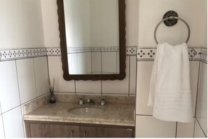 Hair dryer, bidet, towels, soap