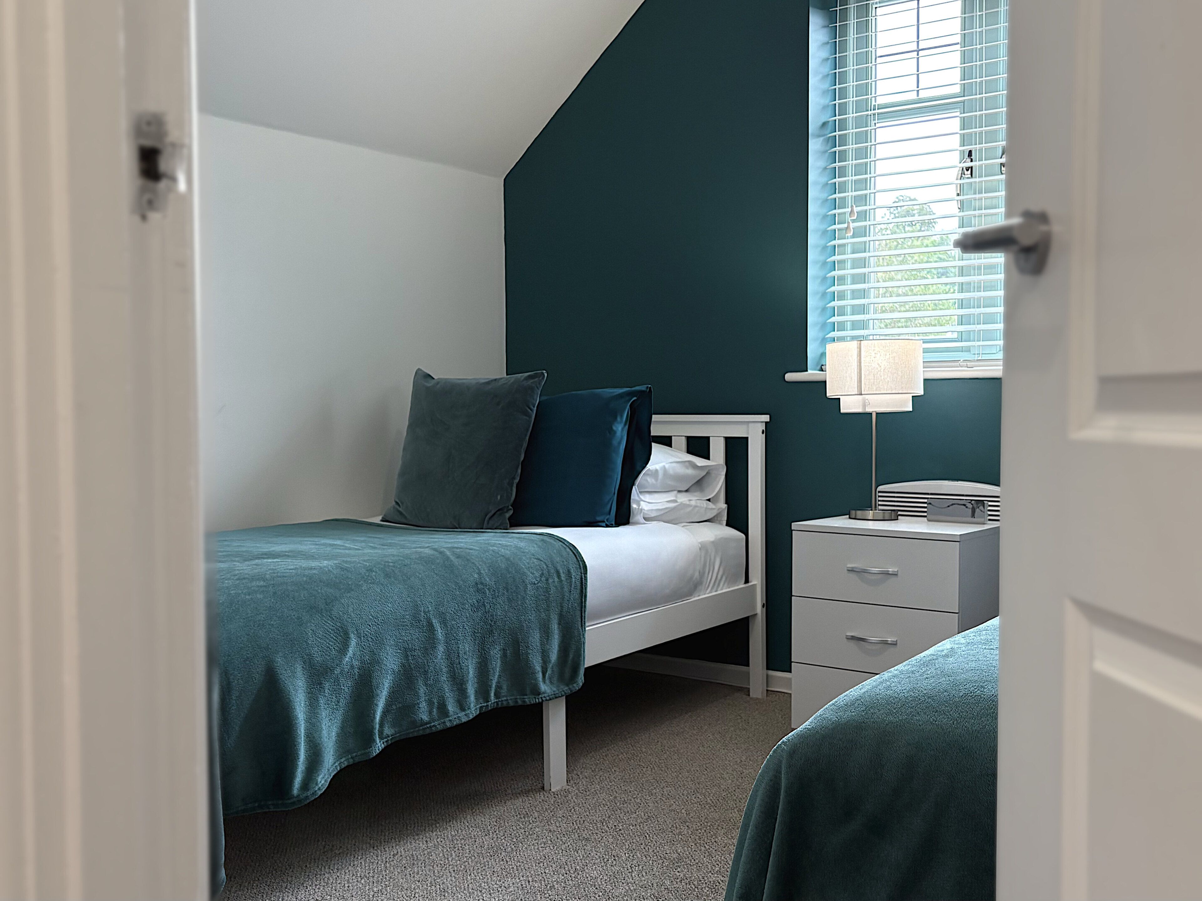 2 bedrooms, desk, iron/ironing board, travel crib