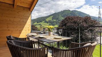 Deluxe Apartment, Balcony, Mountain View | Outdoor dining