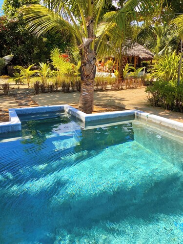 Les Bungalows Dicilaba, l'élégance simple d'un séjour les pieds dans l'eau.