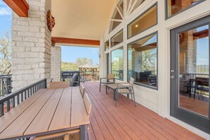 Outdoor dining - Sweeping Hill Country Views | Fire Table, Deck, Designer Home Near Town (Wimberley)