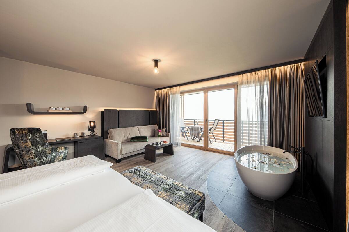 Luxury Suite, Balcony, Mountain View | In-room safe, laptop workspace, blackout curtains, soundproofing