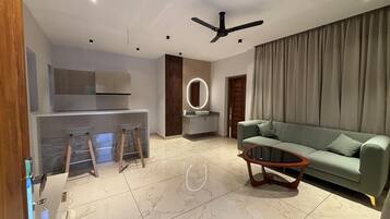 Suite, Pool View | Living area