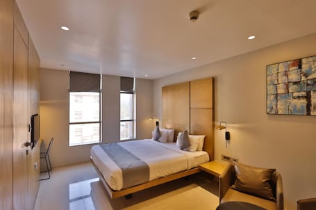 Deluxe Double Room, City View | Desk, laptop workspace, iron/ironing board, free WiFi. OMAAXE MARVEL