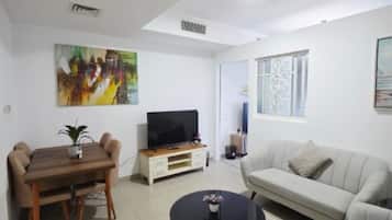 Appartement Confort, balcon, vue plage | Coin séjour