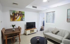 Comfort Apartment, Balcony, Beach View | Living area - Noor Al Amal Real Estate (Sharjah)