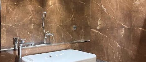 Deluxe Double Room | Bathroom | Hair dryer, slippers, towels, soap