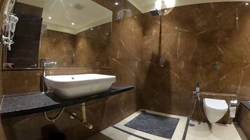 Deluxe Double or Twin Room | Bathroom | Hair dryer, slippers, towels, soap