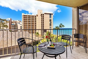 Sip your morning coffee while watching ocean waves from your private balcony, perfectly set up for relaxing with stunning blue water views. - 2 Bedroom Partial Ocean View RK520 (Lahaina)