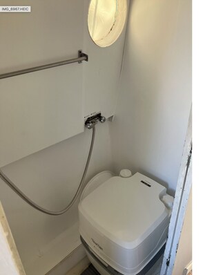 Shower, eco-friendly toiletries, hair dryer, towels