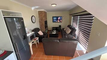 Shared Dormitory, 2 Bedrooms, Private Pool | Living room