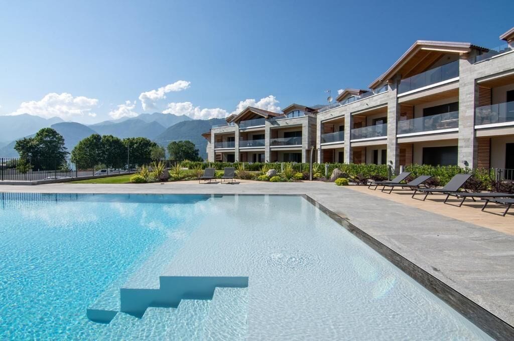 Seasonal outdoor pool, pool umbrellas, pool loungers