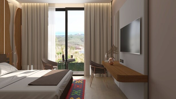 A modern hotel room with a bed, a desk, a chair, a TV, and a balcony with a view.