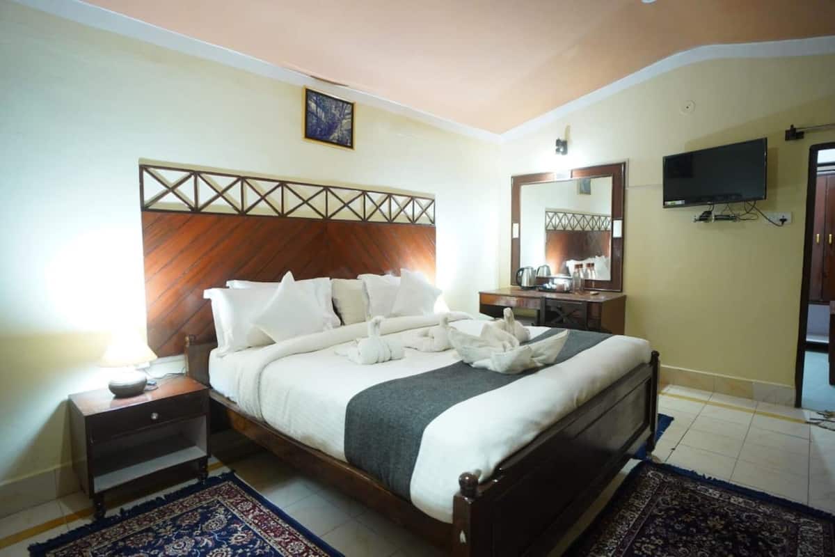 Quarto casal luxo, vista para a cidade