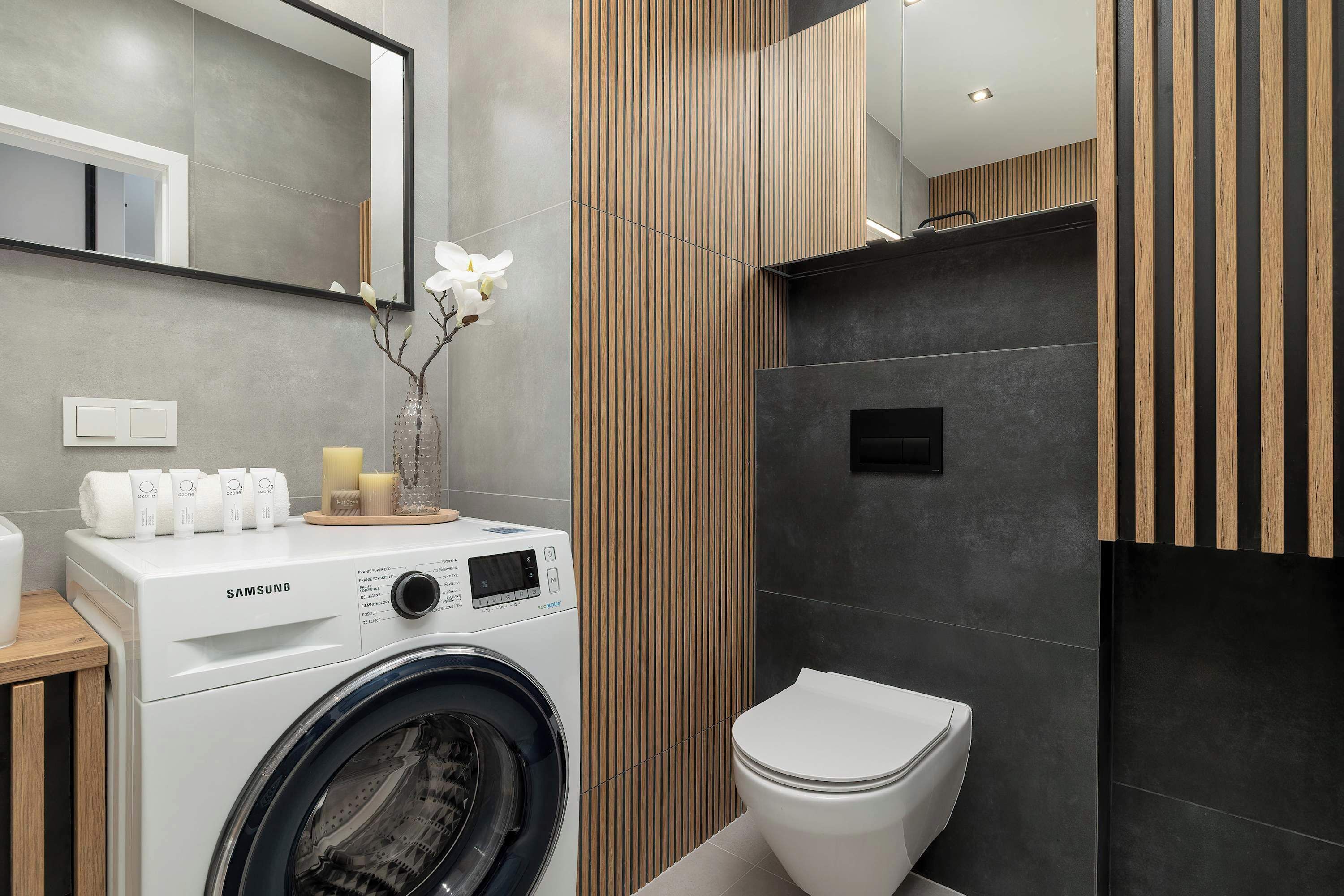 Shower, hair dryer, towels, shampoo