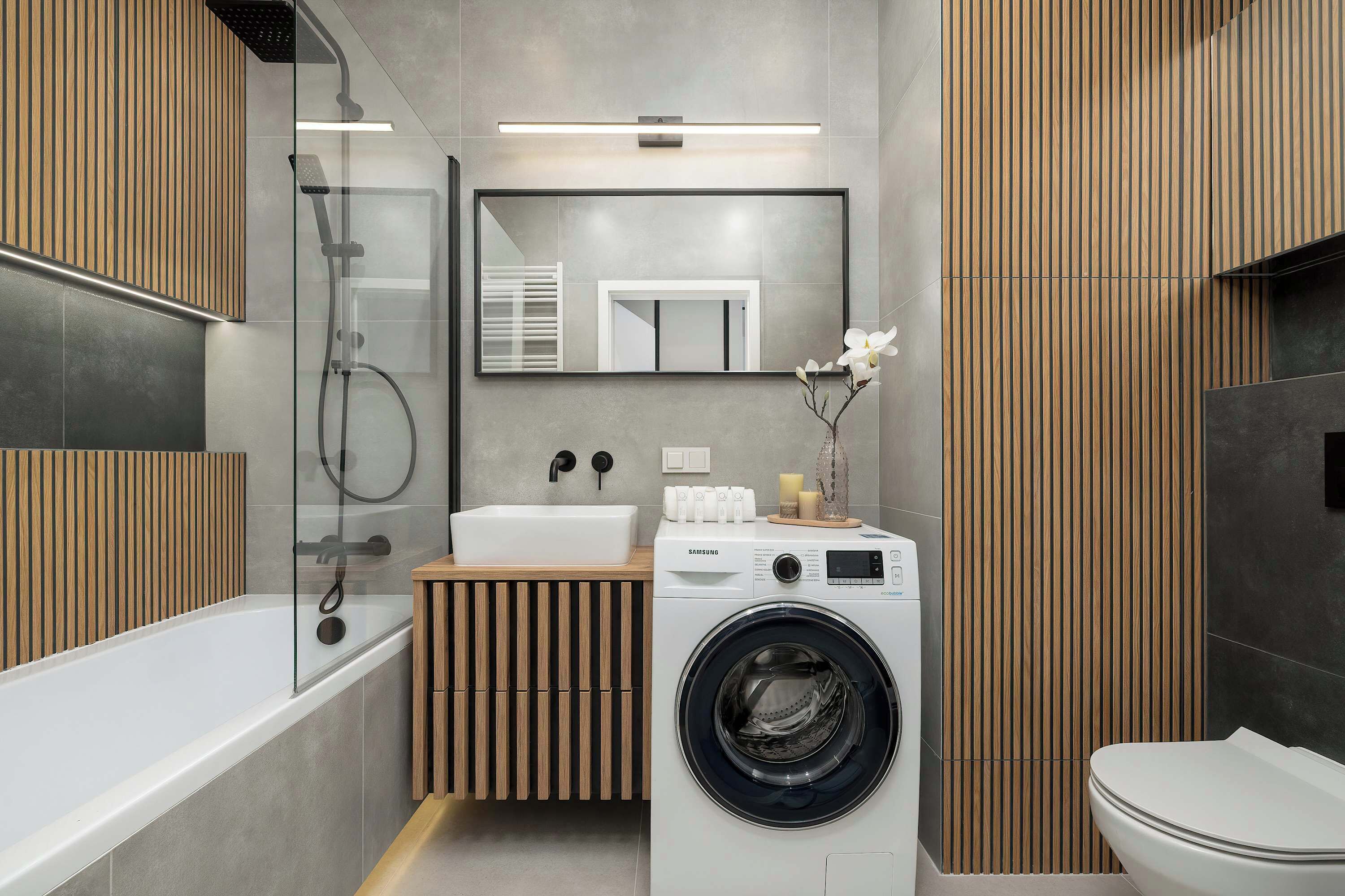 Shower, hair dryer, towels, shampoo