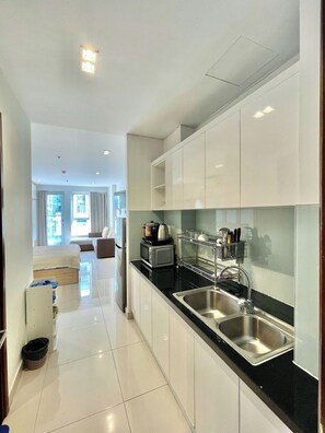 Private kitchen - LaLaHomee Near Airport Sky Center (Tan Binh)