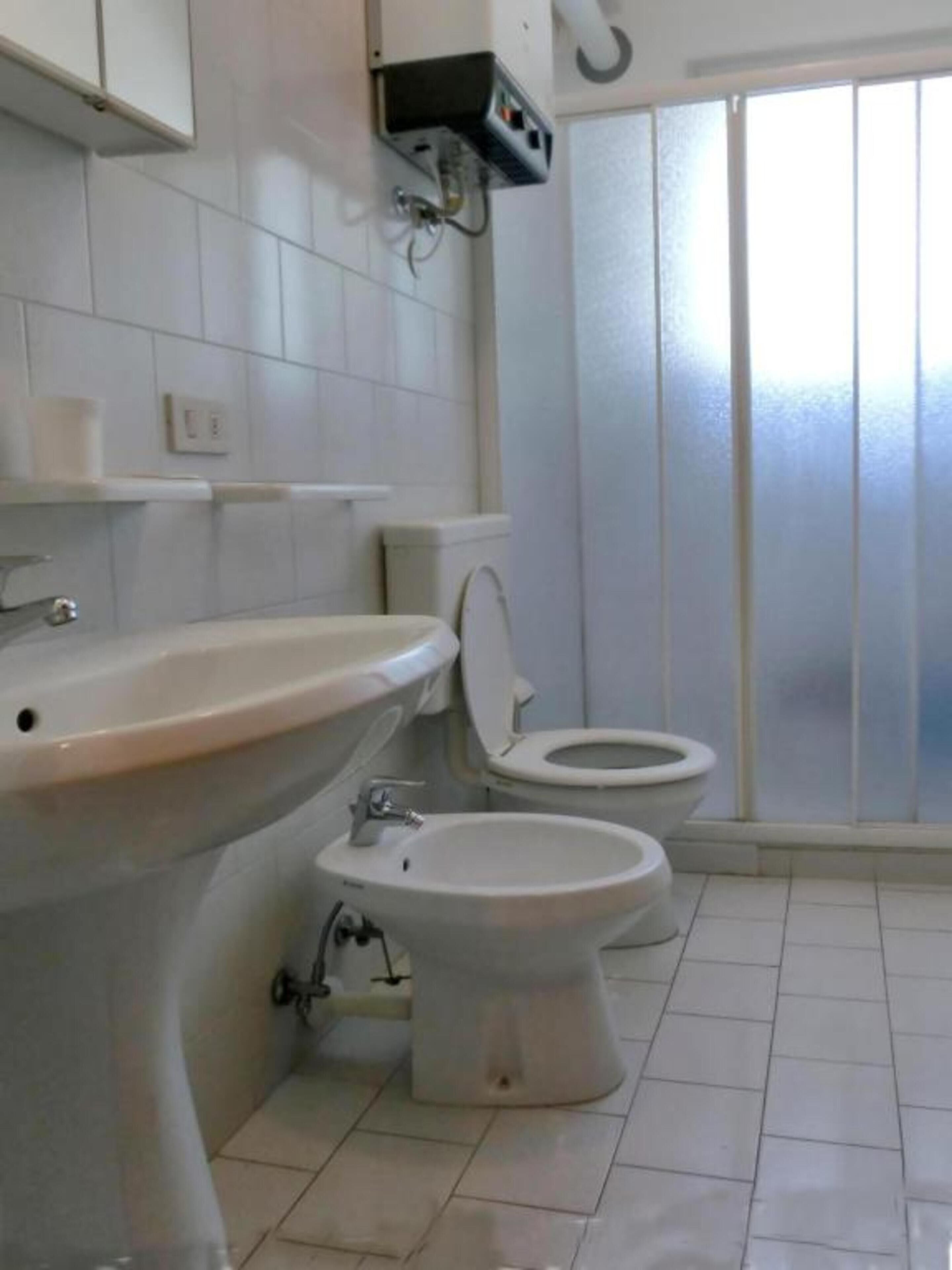 Monolocale, camere multiple, terrazzo | Bagno