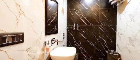 Shower, towels, soap, shampoo