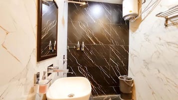 Shower, towels, soap, shampoo