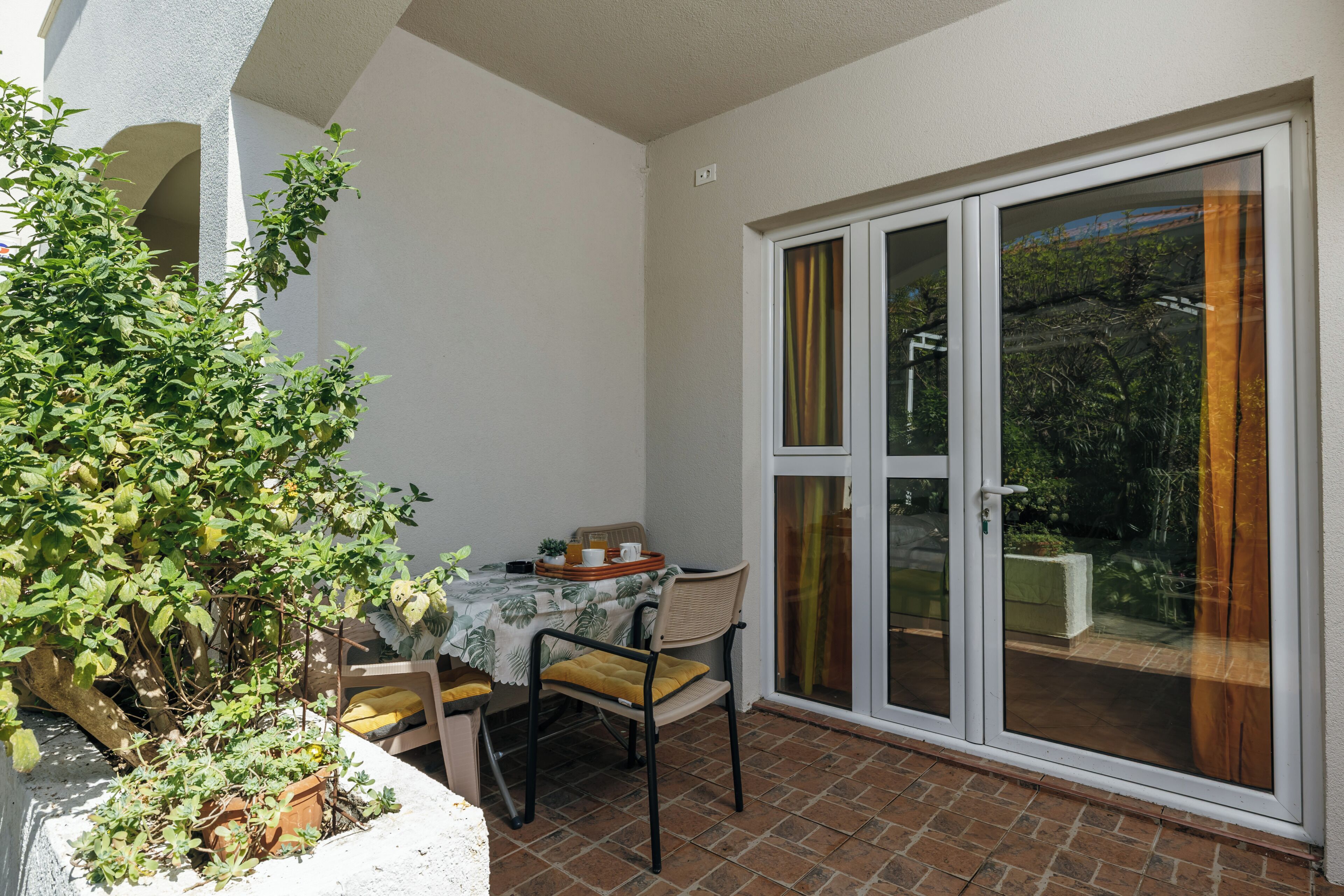 Basic Double Room, Balcony, Partial Sea View | Outdoor dining