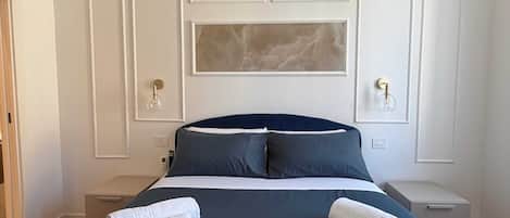 Luxury Double or Twin Room, Private Bathroom | In-room safe, desk, laptop workspace, blackout drapes