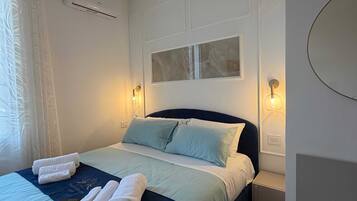 Standaard kamer, 1 twee- of 2 eenpersoonsbedden, privébadkamer | Een kluis op de kamer, een bureau, een laptopwerkplek