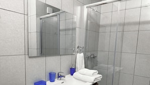 A modern bathroom with a white sink, a mirror, and a shower enclosure. - Holiday Home by the Beach Durres 117 (Durres)