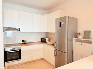 Fridge, oven, electric kettle, cookware/dishes/utensils - Beachfront- Sea View Holiday Home 105 (Durres)