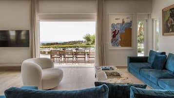 Villa superior, vista al mar | Sala de estar