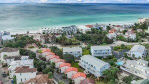 A coastal residential area with buildings, a clear view of the ocean, and a swimming pool. - Casa Azul- Blue Mountain Beach (Santa Rosa Beach)